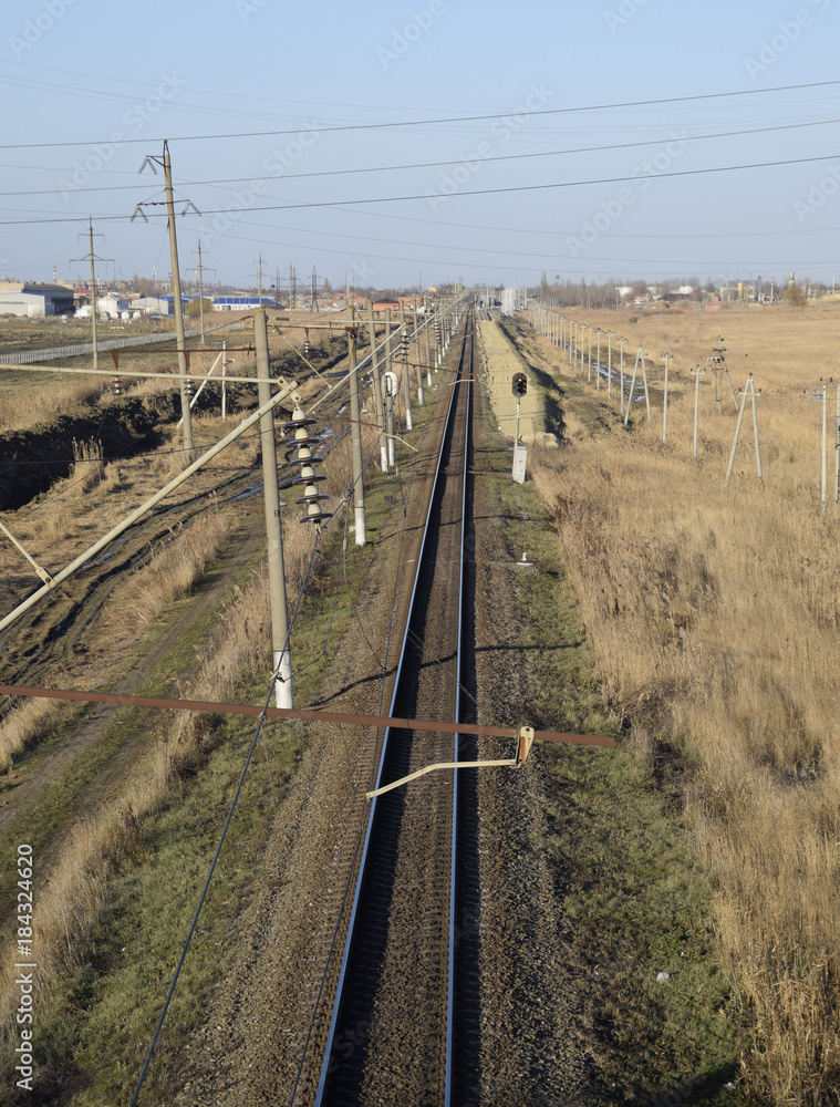 Plot railway. Top view on the rails. High-voltage power lines for electric trains