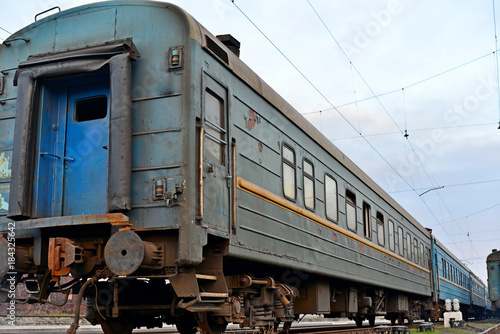 Passenger and freight train. Passenger diesel train traveling speed railway wagons journey light
