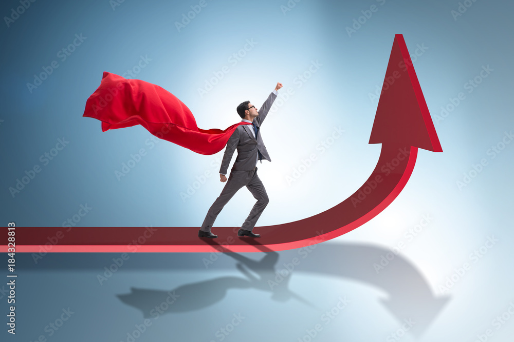 Young businessman in business concept with charts Young businessman in business concept with charts