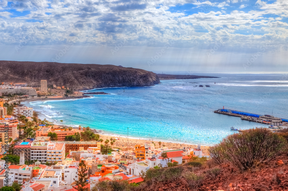 Fototapeta premium Beautiful aerial view over Los Cristianos beach in summer holiday of Tenerife, Canary island, Spain