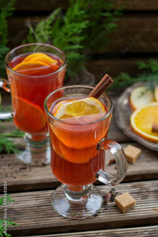 Hot fruit tea with orange, apple, lemon, raisin and spices