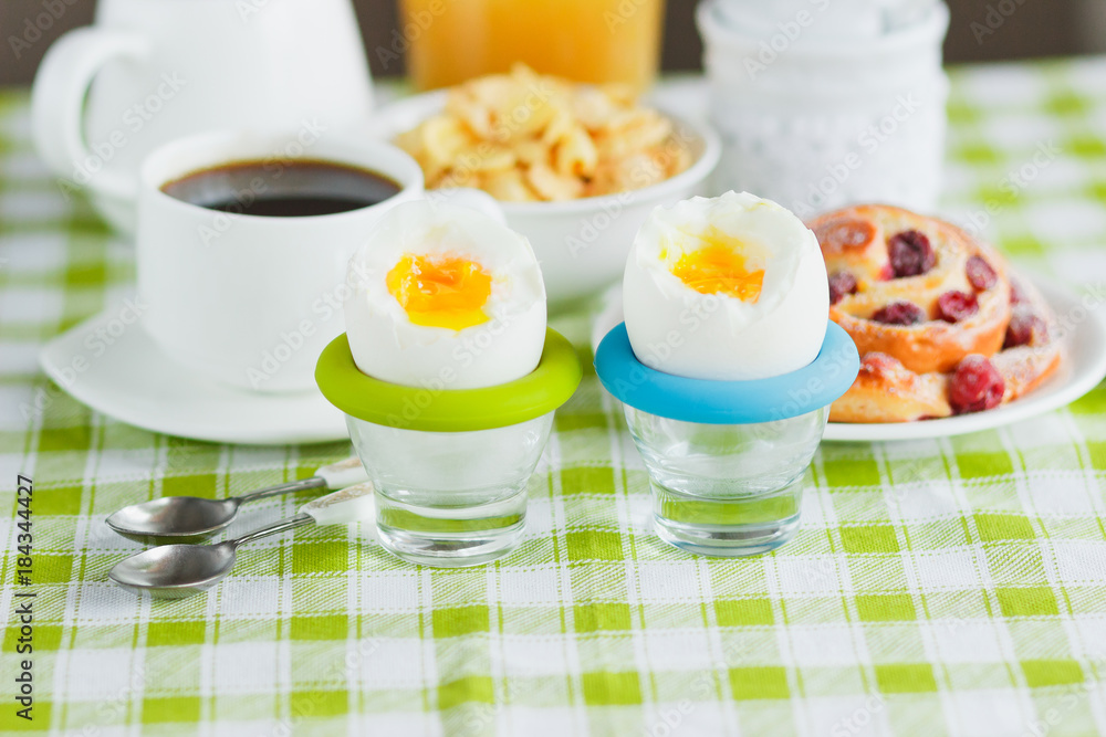 Soft boiled chicken egg, coffee, muesli and orange juice Soft boiled chicken egg, coffee, muesli and orange juice