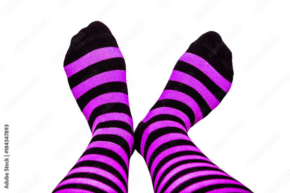 Fun colorful striped socks on isolated background Fun colorful striped socks on isolated background