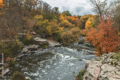 Terrific view of the River Canyon on a sunny fall dayTerrific view of the River Canyon on a cloudy fall day. Buky Canyon on the Hirs'kyi Tikych river in Ukraine