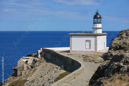 Spain Cadaques Cala Nans lighthouse on the Mediterranean sea shore, Costa Brava, Cap de Creus, Alt Emporda, Catalonia