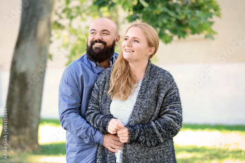 Romantic overweight couple ...