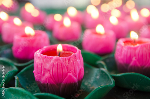 Many burning candles with shallow depth of field