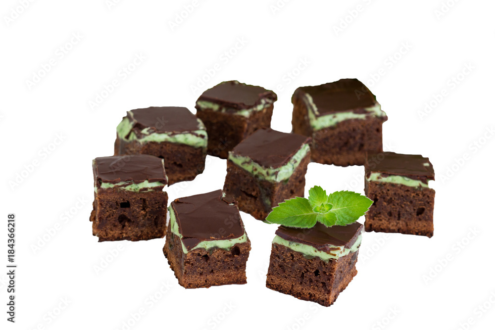 Homemade dark chocolate brownies topping  with mint.