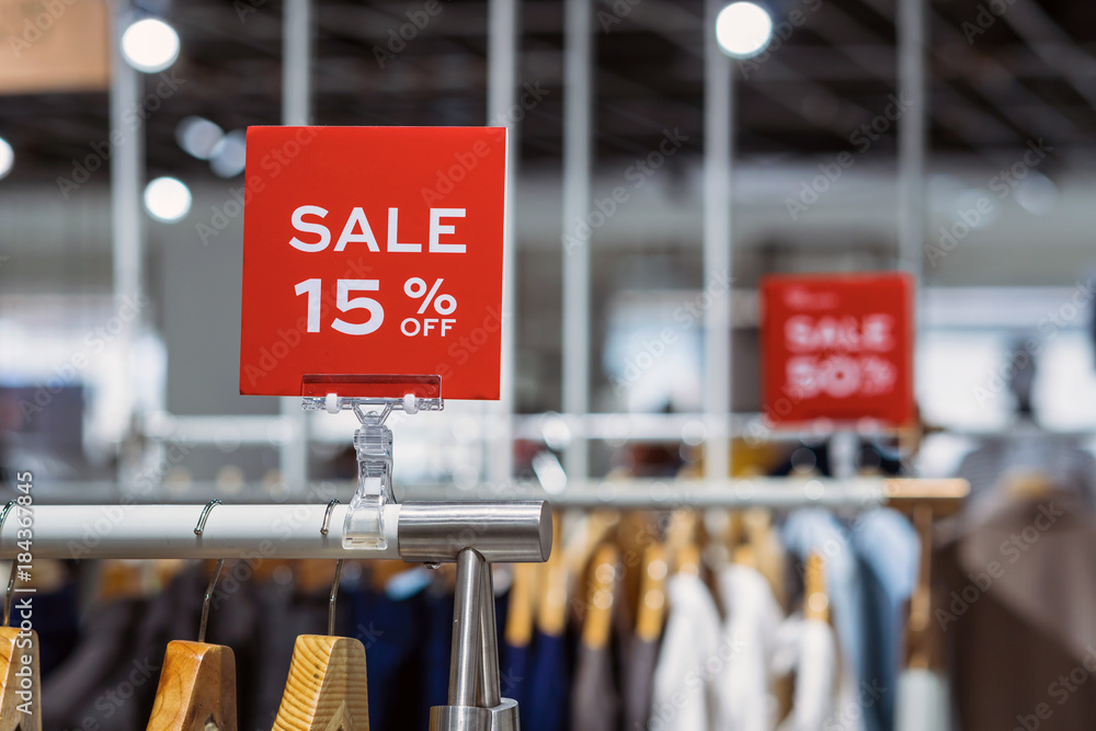 sale 15% off mock up advertise display frame setting over the clothes line in the shopping department store for shopping, business fashion and advertisement concept