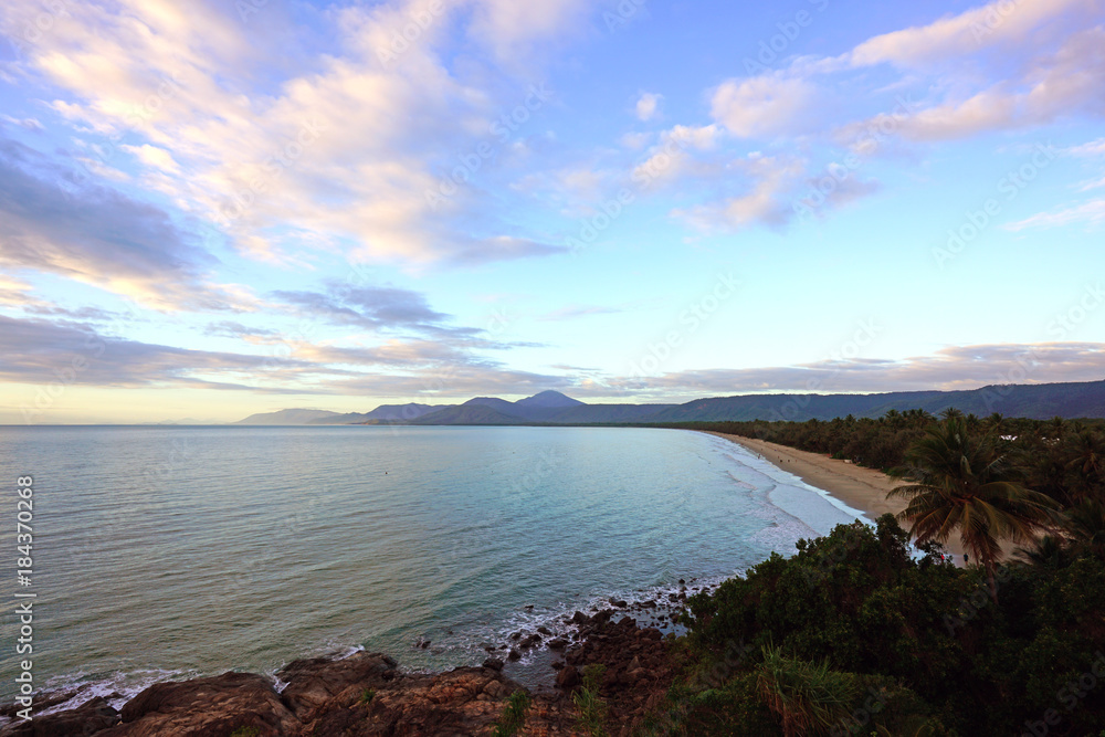 Sunset over the Four Mile Beach overlooking the Coral Sea in Port Douglas, Australia