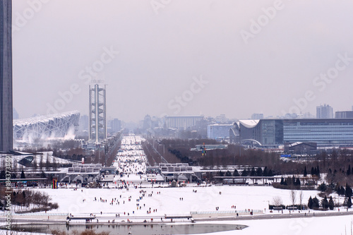 On the first day of snowing, beijing skyline, Beijing Olympic Park distant view