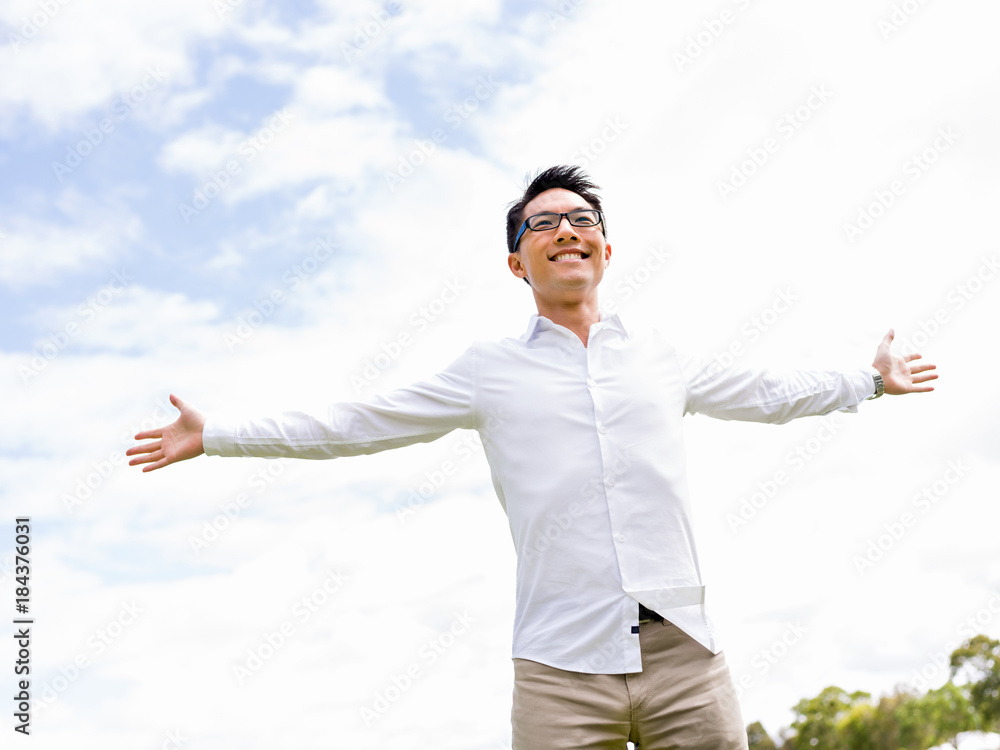Young happy and successful businessman during his break in park Young happy and successful businessman during his break in park