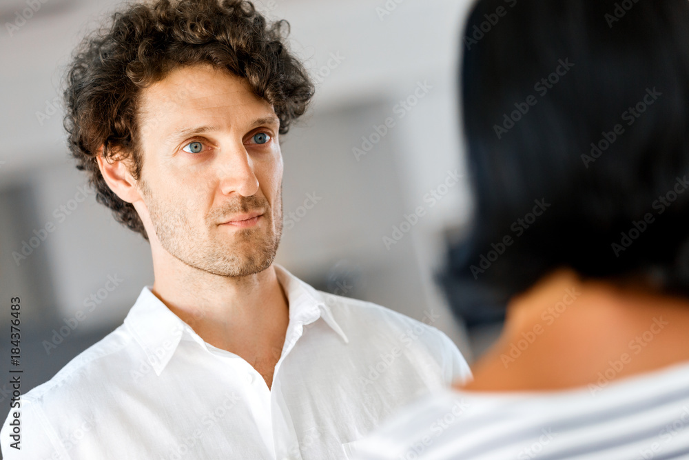 Fototapeta premium Portrait of a smart serious young man