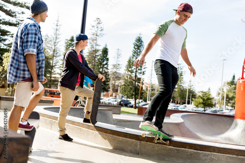 Teenage boys skateboarding outdoors