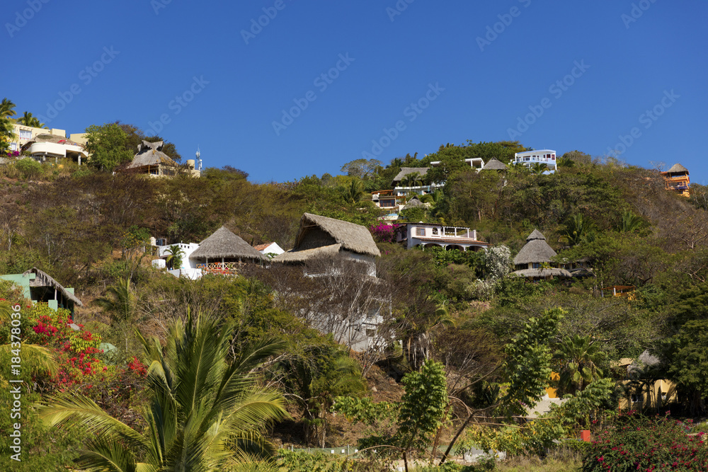 Houses and villas on the hillside of Sayulita, Mexico Houses and villas on the hillside of Sayulita, Mexico