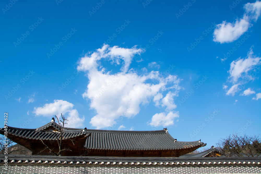 A landscape with traditional Korean fences and roofs. A landscape with traditional Korean fences and roofs.