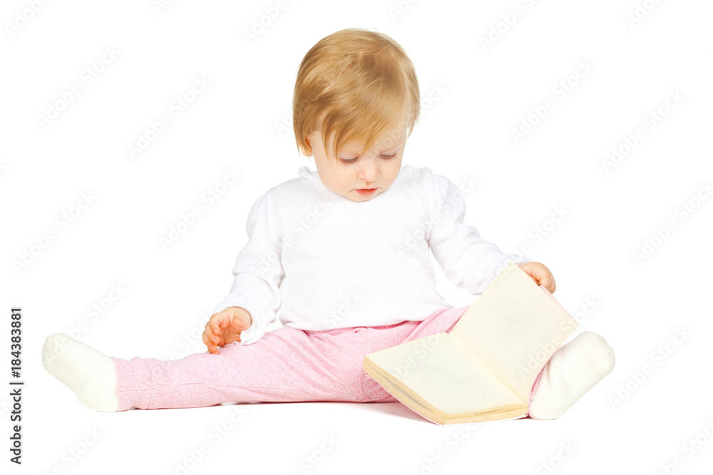 Caucasian baby girl holding a book isolated on white background Caucasian baby girl holding a book isolated on white background