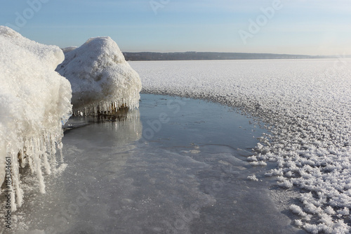 Formation of ice on the river in the fall at sunset, Ob Reservoir, Siberia, Russia © Nataliia Makarova