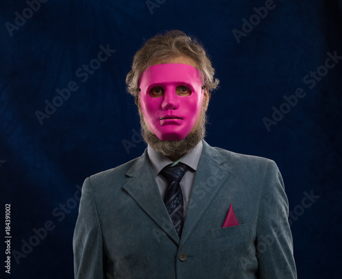 man in a pink mask