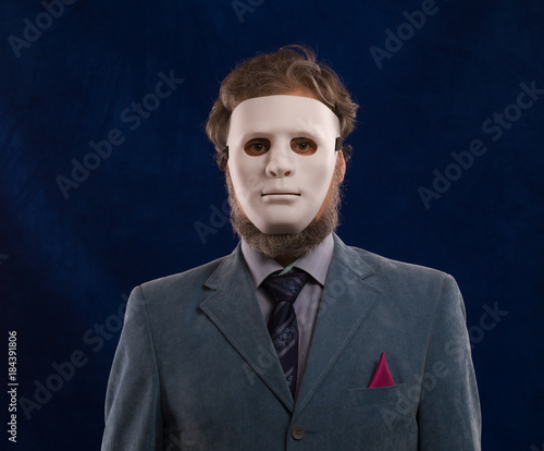 portrait of a man in a white mask