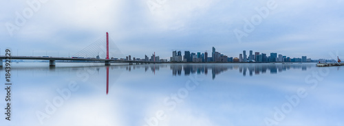 urban skyline and modern buildings under blue sky, cityscape of China.