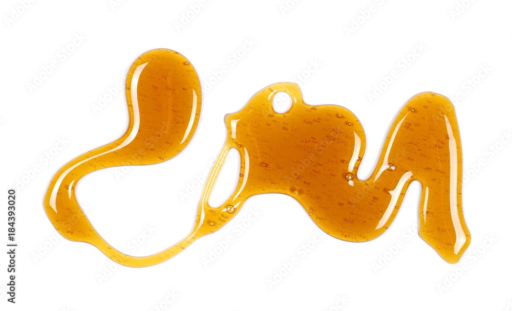 Honey isolated on white background, top view Honey isolated on white background, top view