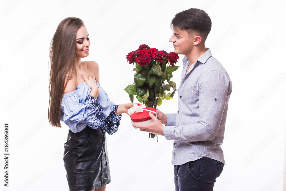 Surprised young woman receiving gifts from her husband on white background Surprised young woman receiving gifts from her husband on white background