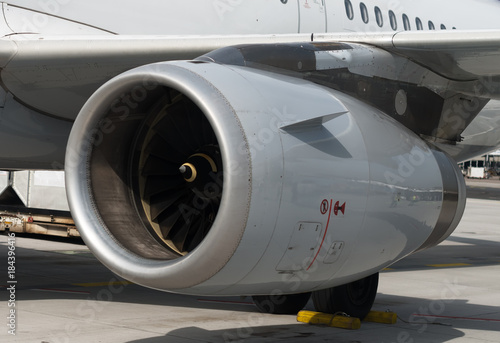 Close-up view of aircraft reaction engine.