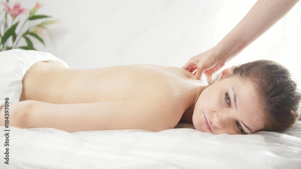 Tibetian massage in spa salon for young woman Tibetian massage in spa salon for young woman