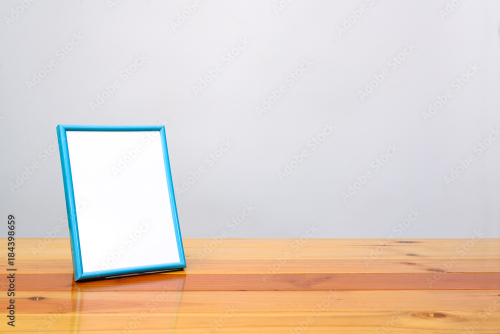 Empty blue photo frame on wooden table with copy space, picture memory. Empty blue photo frame on wooden table with copy space, picture memory.