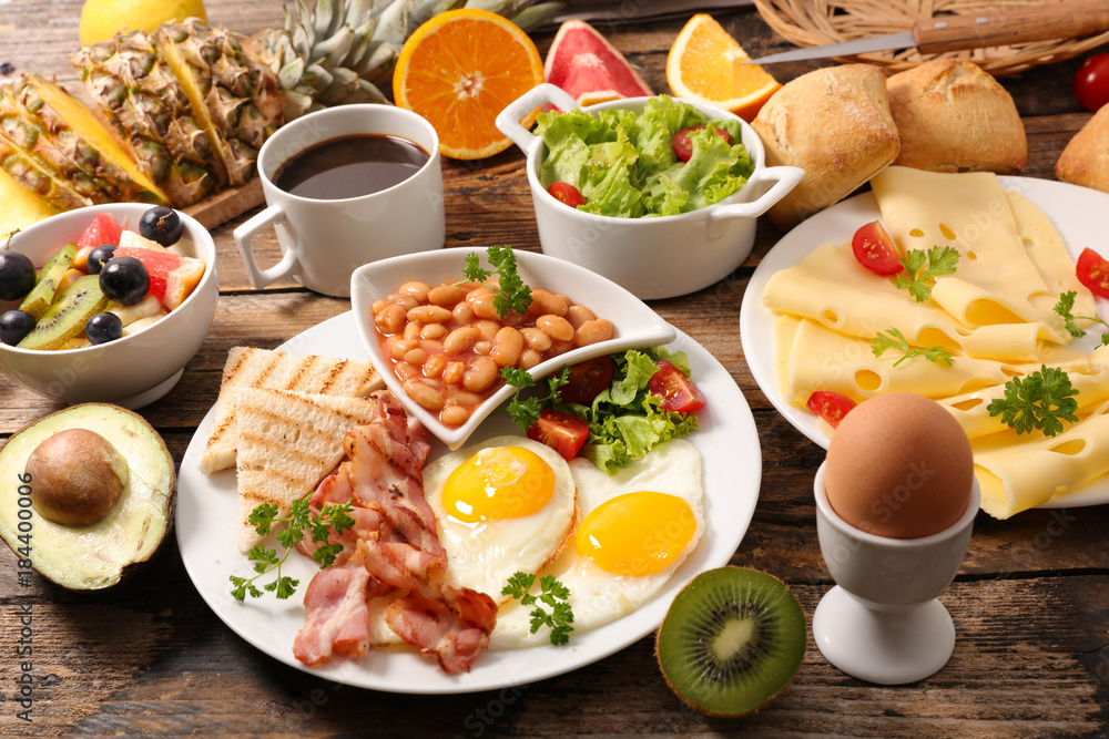 breakfast with egg,bacon,bean,cheese and coffee cup breakfast with egg,bacon,bean,cheese and coffee cup