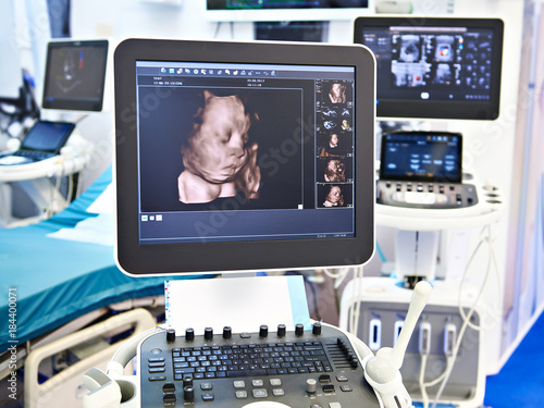 Medical devices for ultrasound examination and screen child head photo