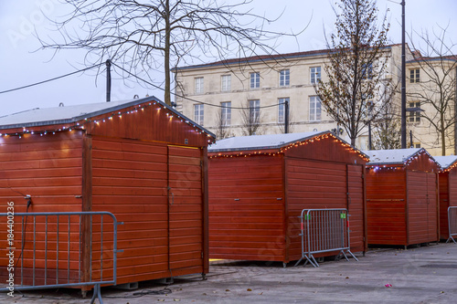 Alignment of Christmas cottages, rear view, on the main square of downtown niort