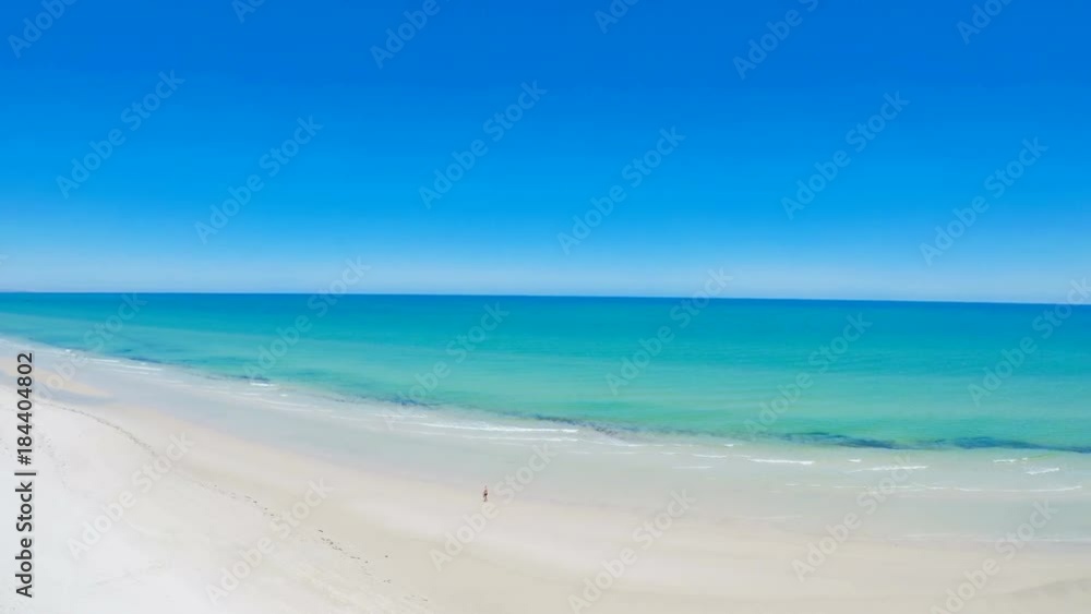 Drone aerial view of wide open white sandy beach, taken at Tennyson Beach, South Australia. Drone aerial view of wide open white sandy beach, taken at Tennyson Beach, South Australia.