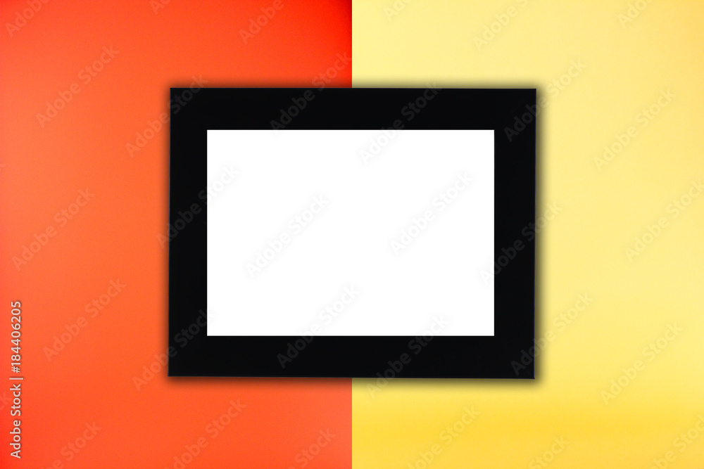 Black photo frame in red and yellow background Black photo frame in red and yellow background