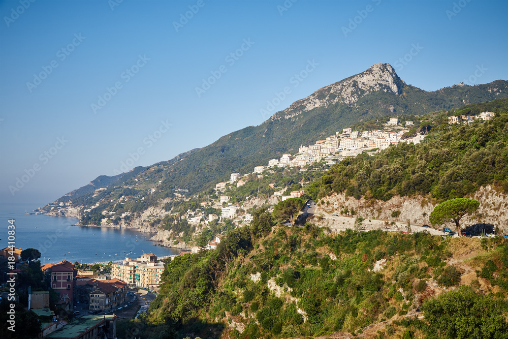 View of the Amalfi coast in a clear summer sunny day with a view of the mountains, the sea and the towns