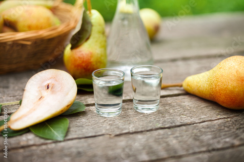 Pear alcohol drink in two shot glass