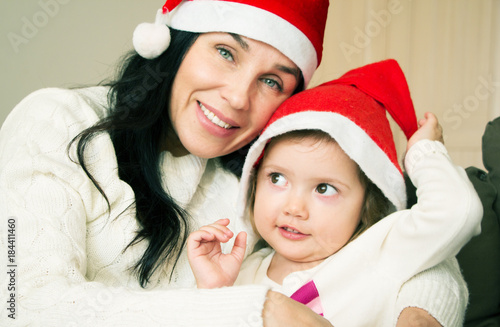 A young grandmother with her granddaughter in the new year