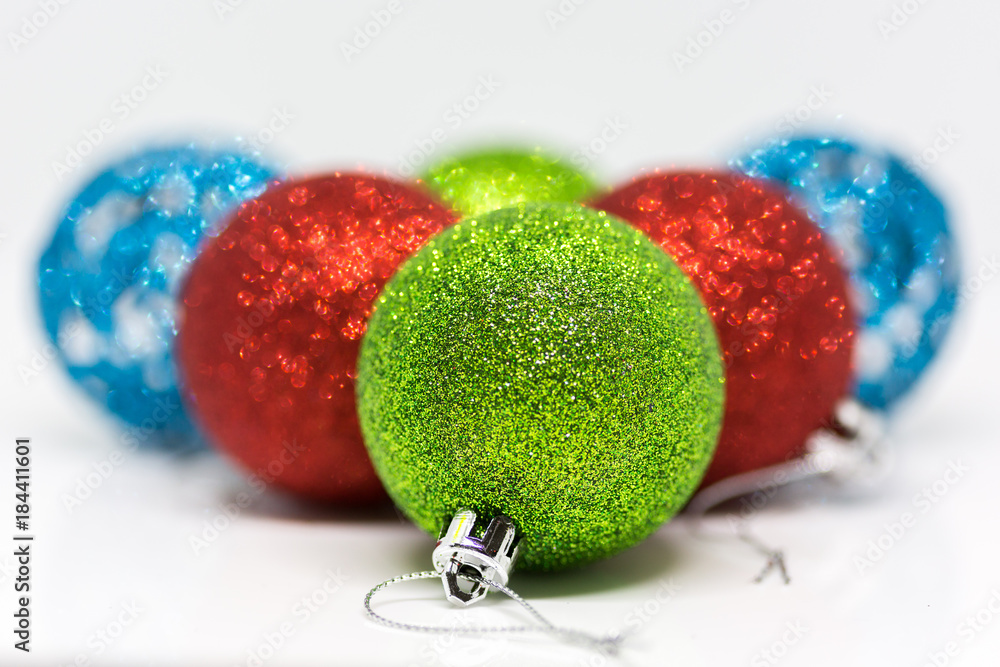 Green and Red Christmas baubles on a white background Green and Red Christmas baubles on a white background