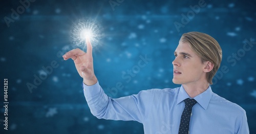 Businessman touching air light glow