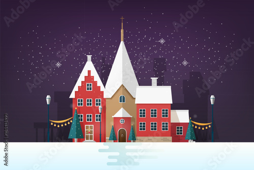 Winter cityscape or urban landscape in snowy evening with antique buildings and holiday street decorations