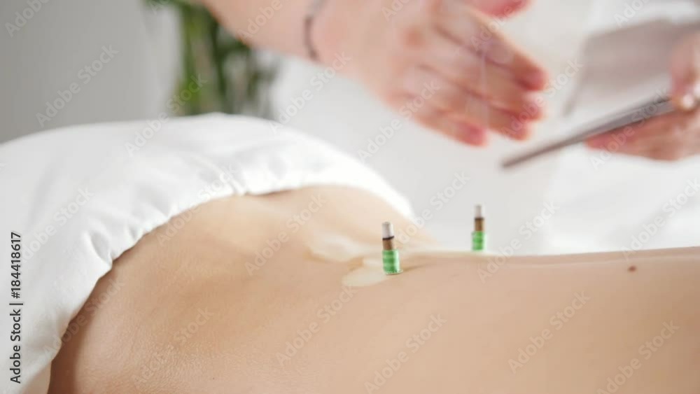 Procedure of tibetan medicine for young beautiful woman - impact smoke on body skin Procedure of tibetan medicine for young beautiful woman - impact smoke on body skin