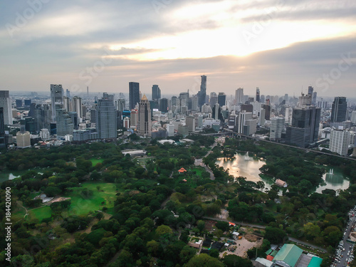 Bangkok skyline with green park sunset