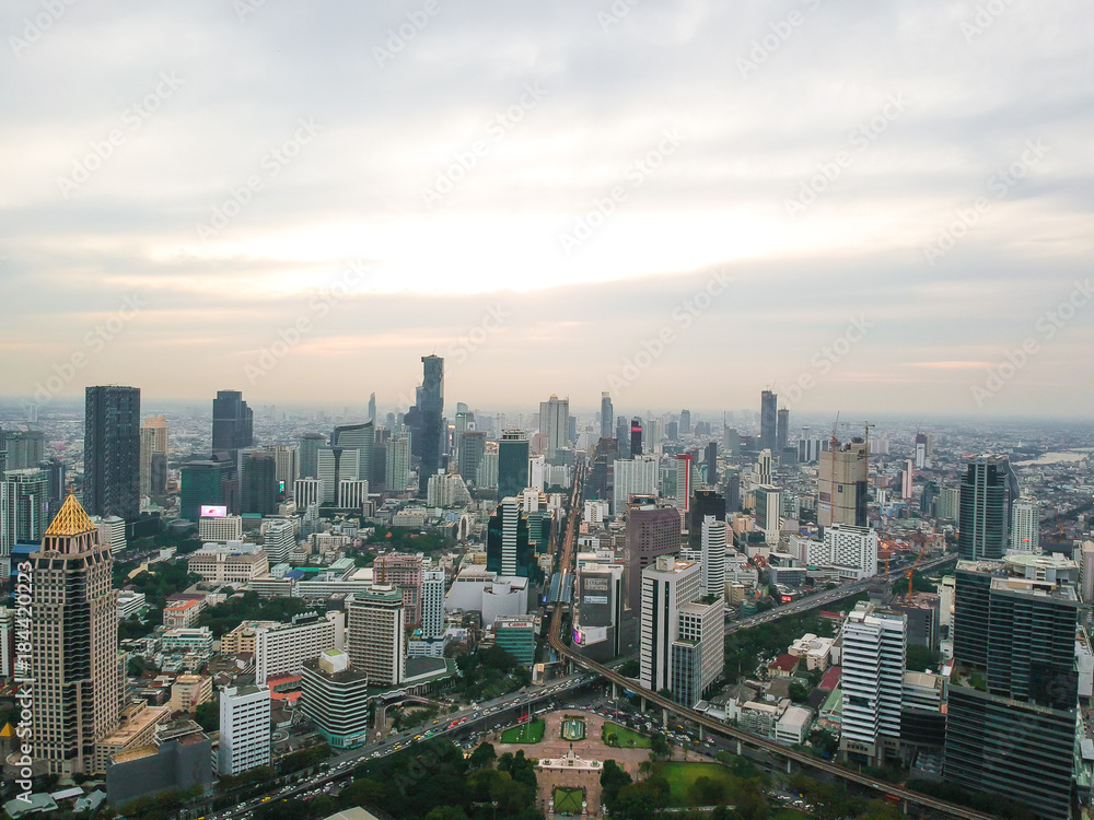 Bangkok skyline with green park sunset