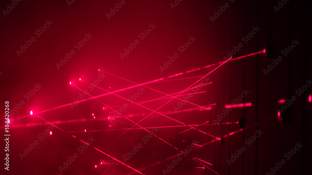 Security laser system alarms when thief try to rob bank and fails in crossing red beam - obrazy, fototapety, plakaty 