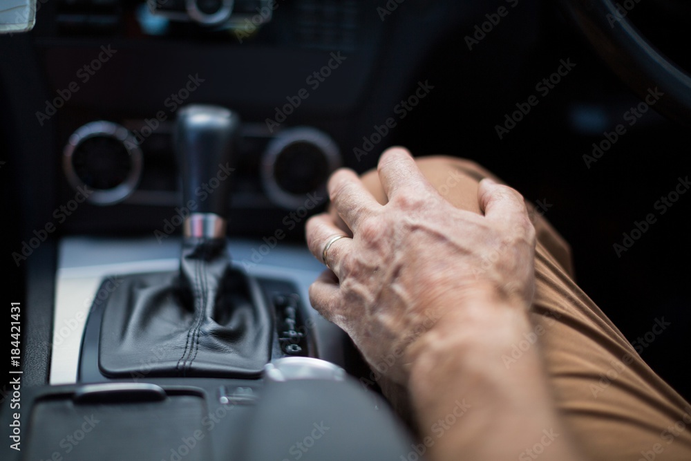 Close up of man sitting in car