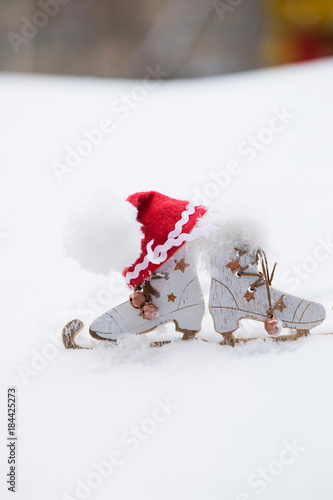 Wallpaper Mural Wooden made skates and Santa Claus hat. Closeup Torontodigital.ca