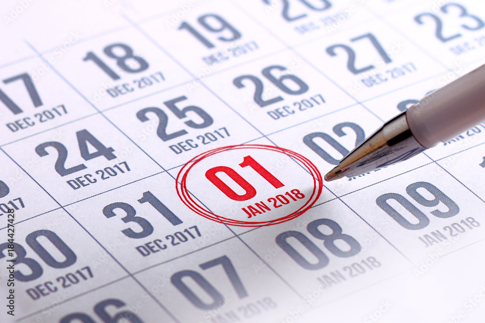 Close up of first day of the year 2018 on diary calendar. Close up of first day of the year 2018 on diary calendar.