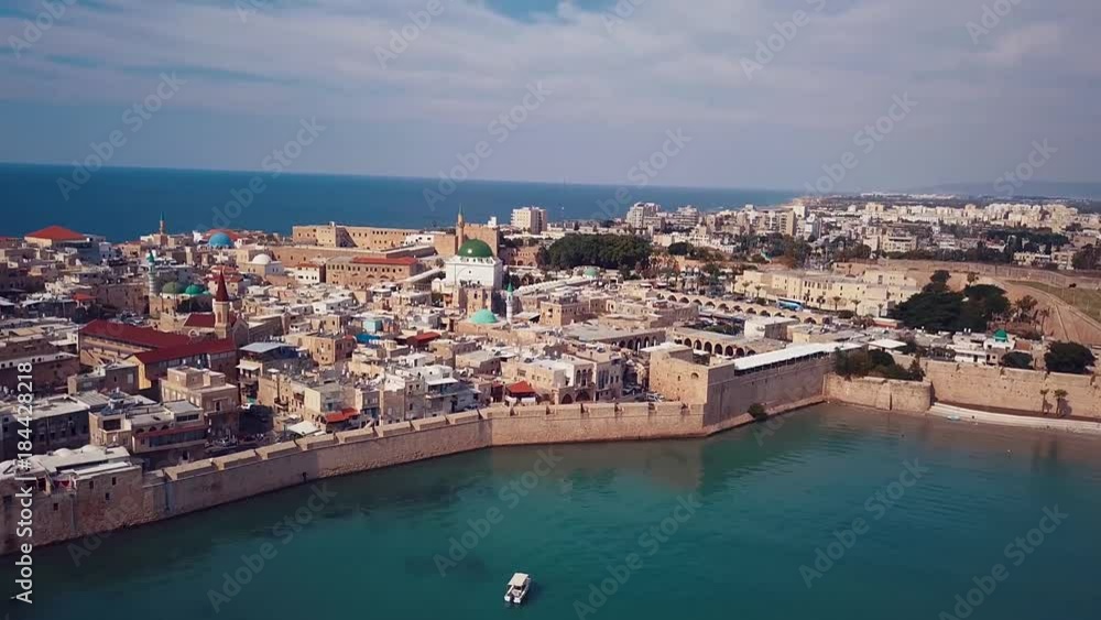 Mediterranean port city Acre (Akko) surrounded by ancient stone walls - Aerial shot | 4k UHD Mediterranean port city Acre (Akko) surrounded by ancient stone walls - Aerial shot | 4k UHD