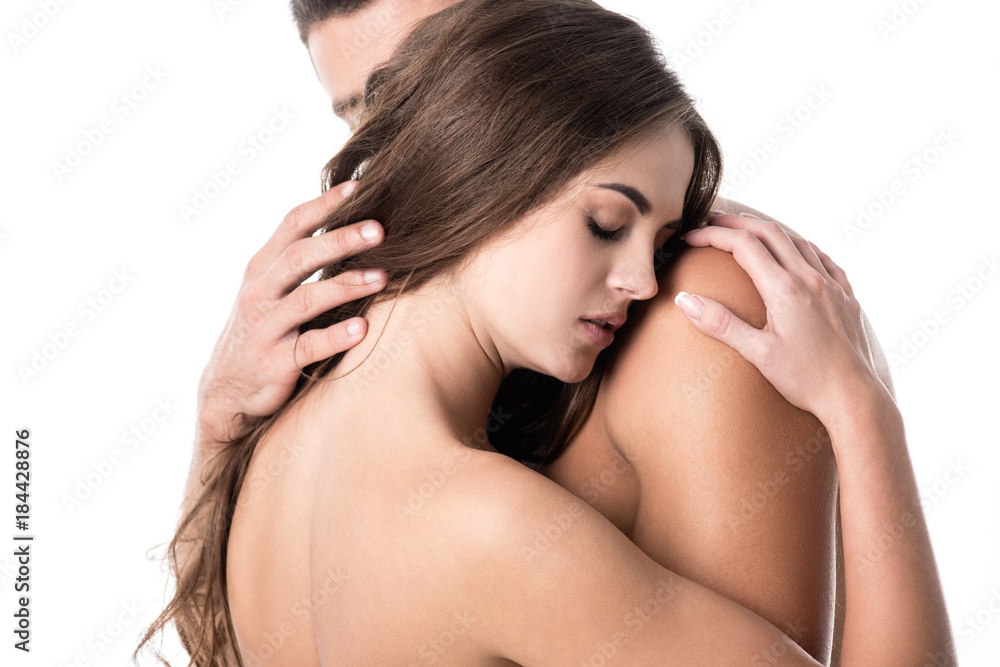 Obraz premium young sensual naked couple isolated on white